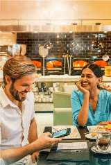 Man scanning bill using SHARE app on mobile phone